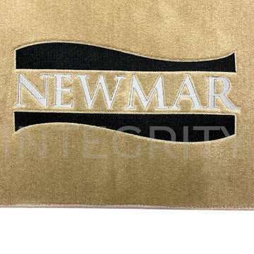 Newmar RV Cockpit Mat with Logo in Sand 64 in. x 53.75 in. 143525A